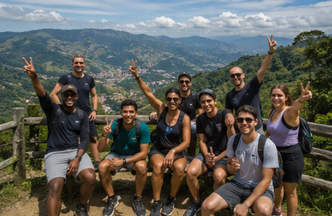 Group hiking through La Romera nature reserve with mountain vegetation